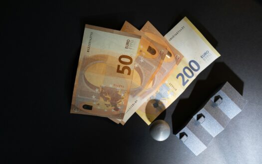 A bunch of money sitting on top of a table