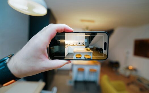 A person taking a picture of a living room